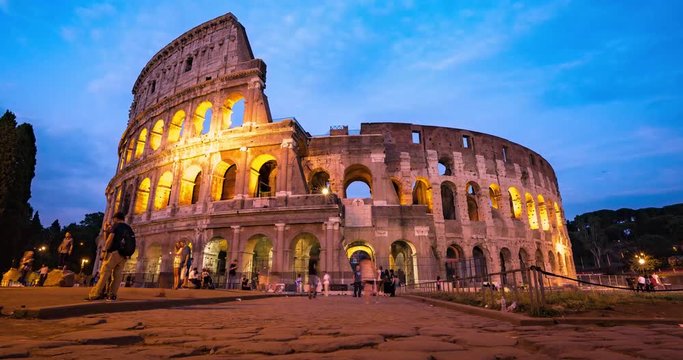 Rome Sunset With Colosseum Architecture Detail At Night Dusk Landmark in City Center Timelapse 4K. Colosseum View at Sunset.