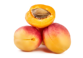 Isolated apricots. Fresh apricot fruit isolated on white background. Tropical abstract background. Fresh fruits. Place for your text.