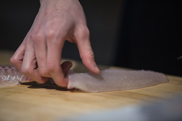 Handwork Slicing Fresh sea food, making sashimi