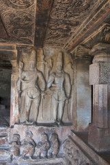 Carved Shiva figures in mantapa, Ravanaphadi rock-cut temple, Aihole, Bagalkot, Karnataka. Shiva linga in the sanctum is also seen.