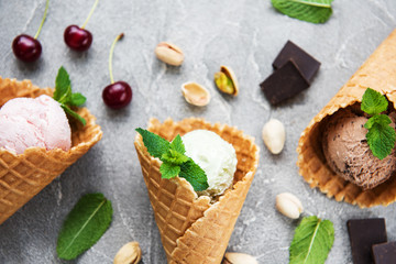 set of ice cream scoops of different colors and flavours