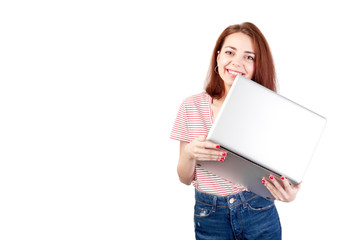 Fototapeta premium Surfing the Internet. Girl working on laptop, isolated on white background.