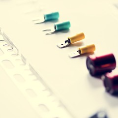 Closeup of various capacitors on white background