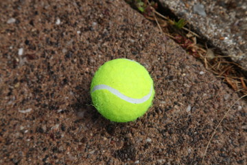 Tennis Ball on Concrete