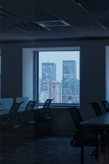 empty office and windows by night