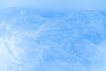 Fototapeta premium Transparent fabric background in blue color