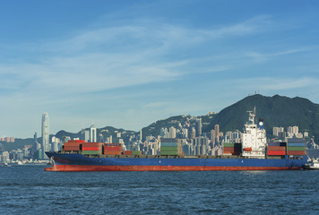 Cargo ship in Victoria Harbor of Hong Kong