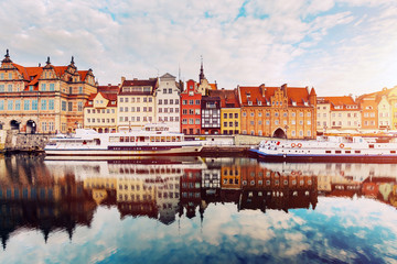 Building facades of Old Town in Gdansk and Motlawa river.