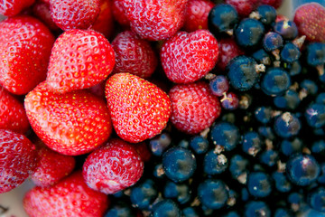 Fresh berries of strawberries of black currant
