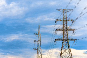 Electricity concept. Close up high voltage power lines station.