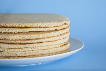 Cakes for a honey cake homemade dessert blue background isolated