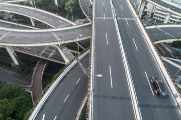 Aerial view of highway and overpass in city