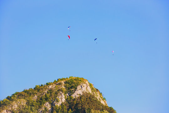 
Paragliders train on the lake Serre-Poncon. France.