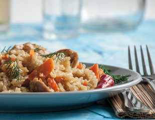 White rice with vegetables and herbs.