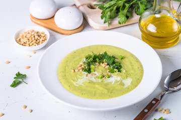 Zucchini Cream soup on white.