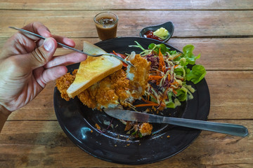 Fried fish steak in crispy batter had eating.