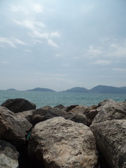 Fototapeta na wymiar Large grey rocks on the Italian coast