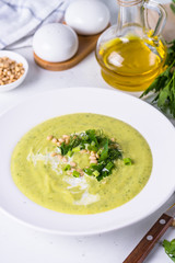 Zucchini Cream soup on white.