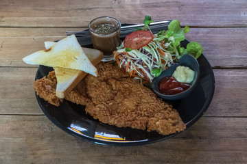 Fried fish steak in crispy batter.