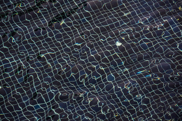 Beautiful ripple wave and blue water surface in swimming pool