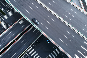 Aerial view of highway and overpass in city