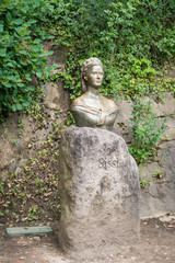 Trauttmansdorff Garden in Meran (Merano), Italy - june 27, 2018: the statue of the empress sissi along the boulevard in the botanical gardens of Trauttmansdorff