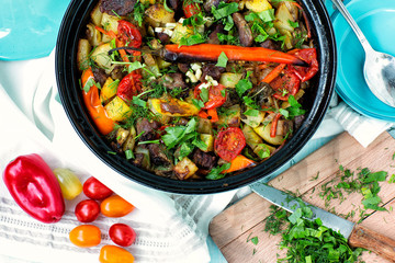Cooking. vegetable stew on the table. chopped greens. produce