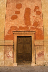 A church door in the historic town of Vittorio Veneto in the Veneto region of north east Italy
