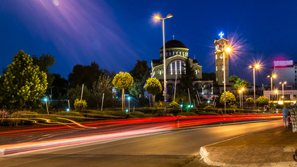 Naklejka premium Light Trails On A Greek Road At Night