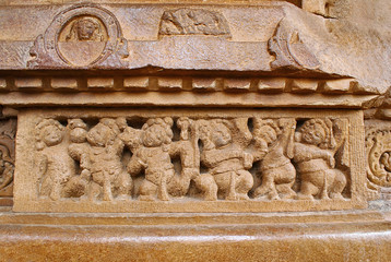 Figures of the shiva ganas servants of the lord Shiva carved on the plinth, Durga temple, Aihole, Bagalkot, Karnataka. The Galaganatha Group of temples.