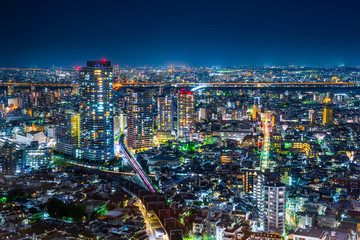 Obraz premium Asia Business concept for real estate and corporate construction - panoramic urban city skyline aerial view under twilight sky and neon night in tokyo, Japan