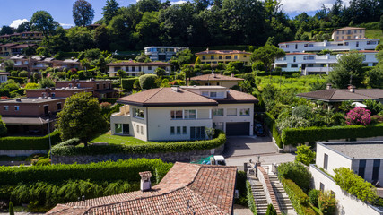 Aerial view of modern villa with large garden