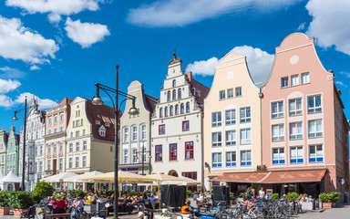 Fototapeta premium Tourists on the terraces of the square