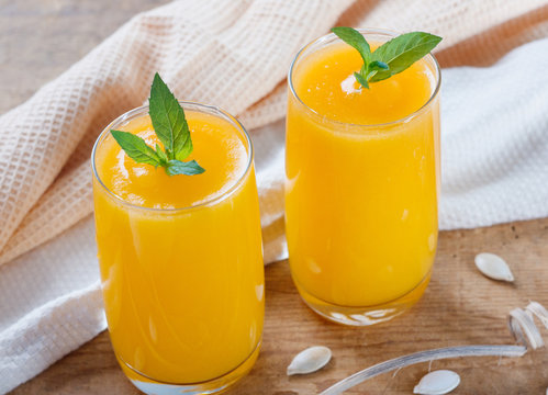 Healthy pumpkin fruit smoothie with seeds and mint leaves