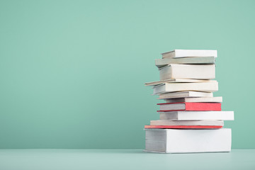 Stack of mini old books.	