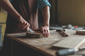 Young carpenter in uniform