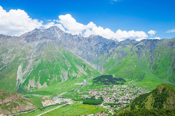 View of Caucasus Mountains and Stepantsminda village (formerly Kazbegi). Georgia