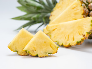 sliced pineapple isolated on white background