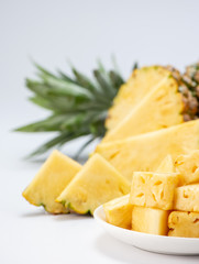 sliced pineapple isolated on white background