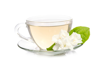 Glass cup of Tea with jasmine flowers isolated on white background