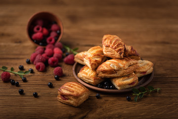 Fresh tasty pastries with raspberry jam.