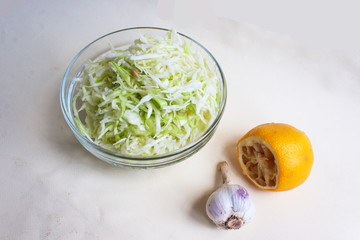 Fresh cabbage salad with garlic and lemon juice. Candid.