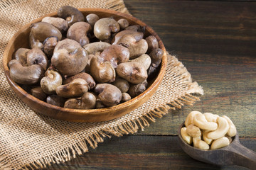Cashew nuts on wooden background - Anacardium occidentale
