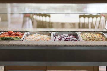 Buffet trays and white plates