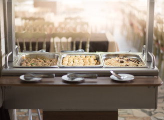 Buffet trays and white plates