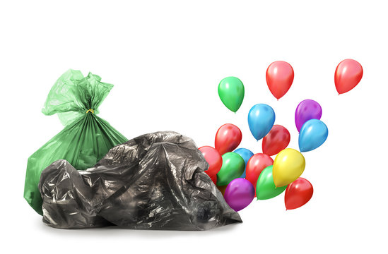 Eco concept. Out of the garbage bag are fly balloons. The concept of recycling garbage.