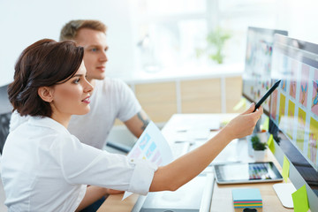 Fototapeta premium Web Designers Working On Project On Computer