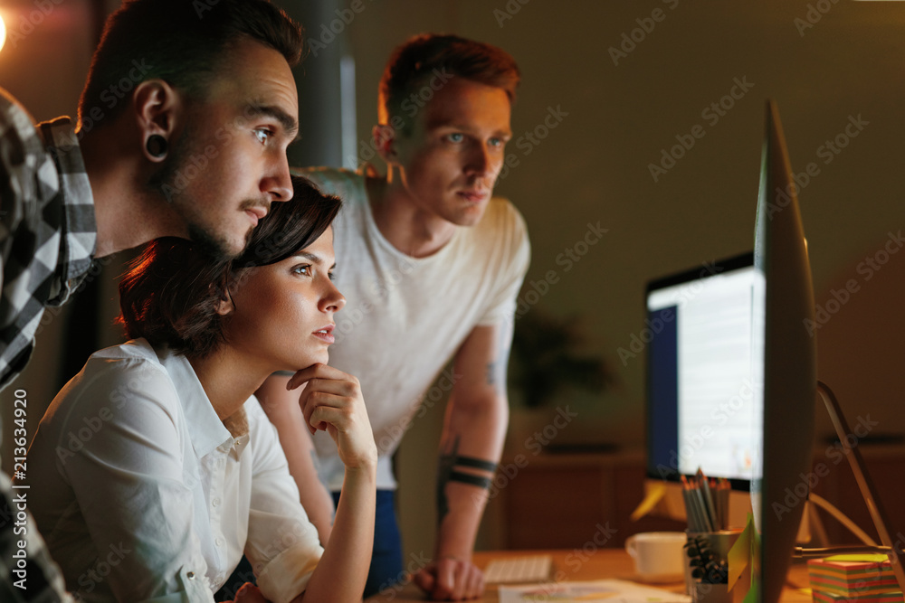 Poster Programmers Working On Software In Office
