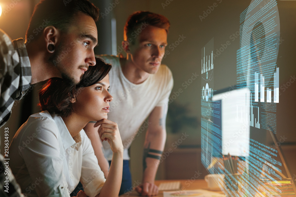 Poster Programmers Working On Software In Office