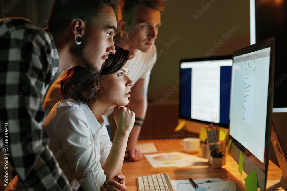 Poster Programmers Working On Software In Office